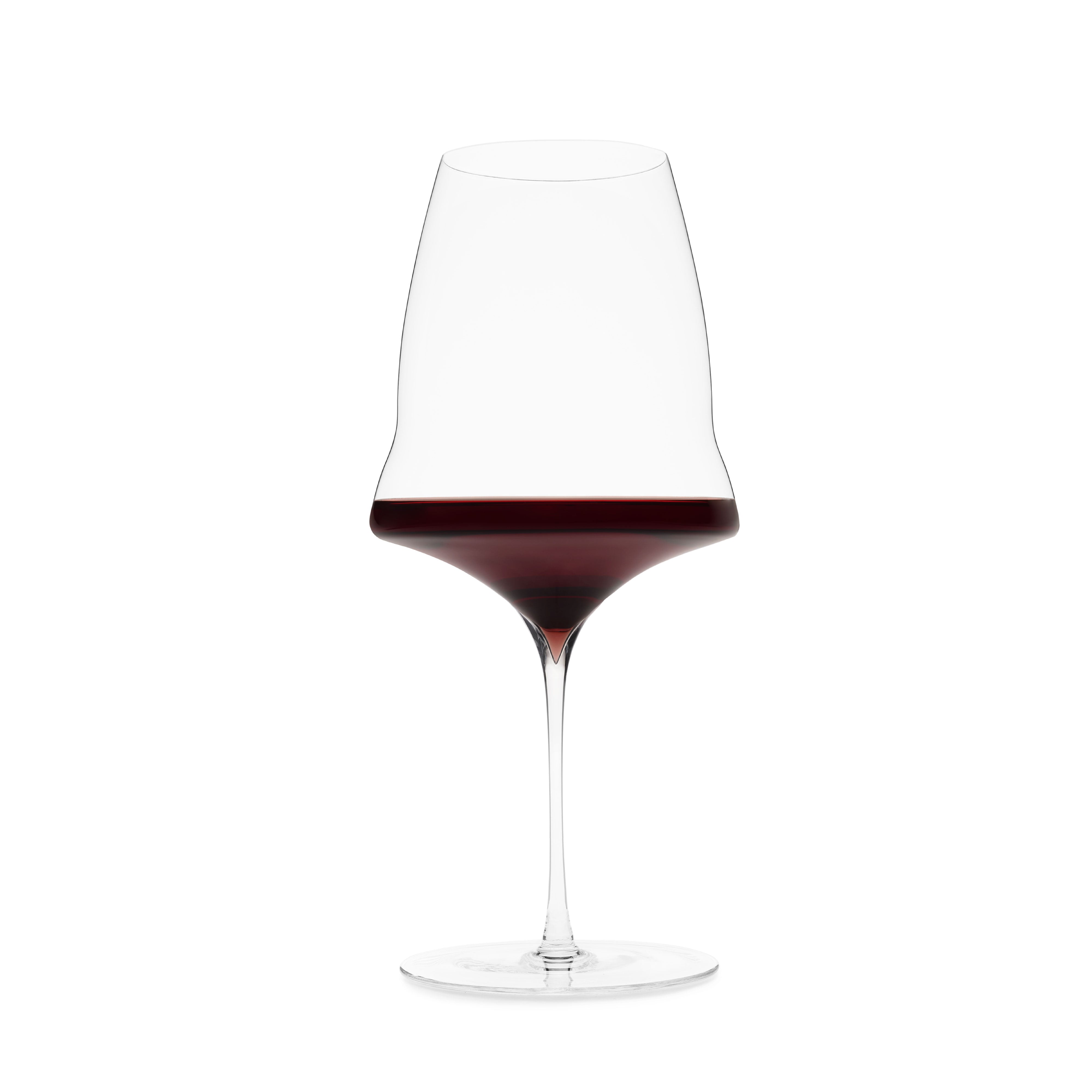 Single red wine glass filled with red wine by Josephinenhütte